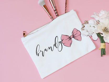 pink bow personalized bridesmaid makeup bag with tassel gold zipper pretty script girly bride cosmetic pouch bridesmaids gifts bridal party